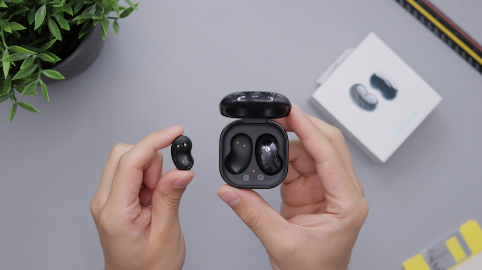 Compact wireless earbud case size